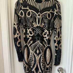 Elegant Black and Gold Patterned Dress